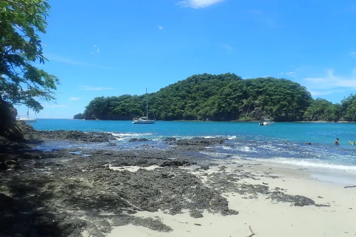 a group of people on a beach