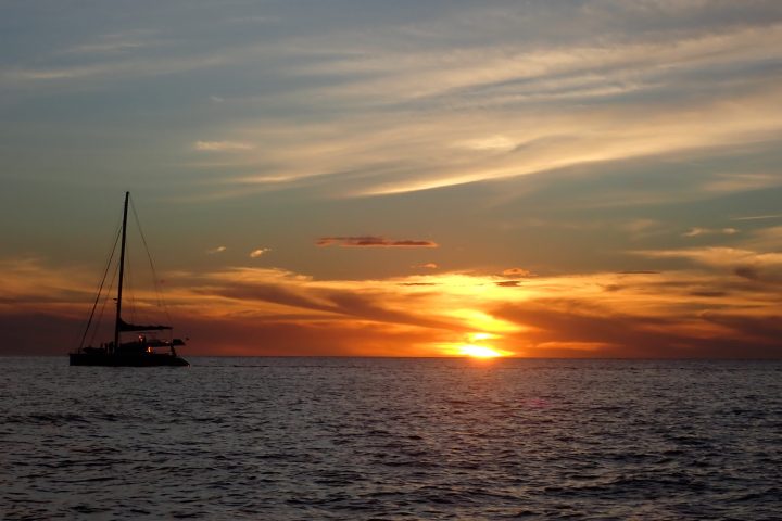 a sunset over a body of water