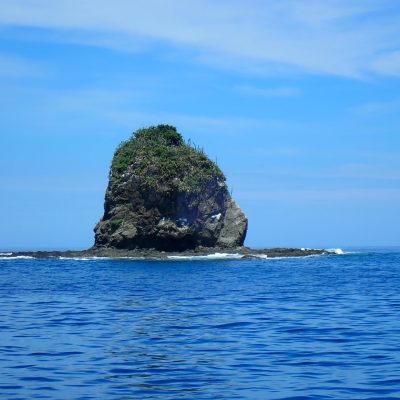 an island in the middle of a body of water