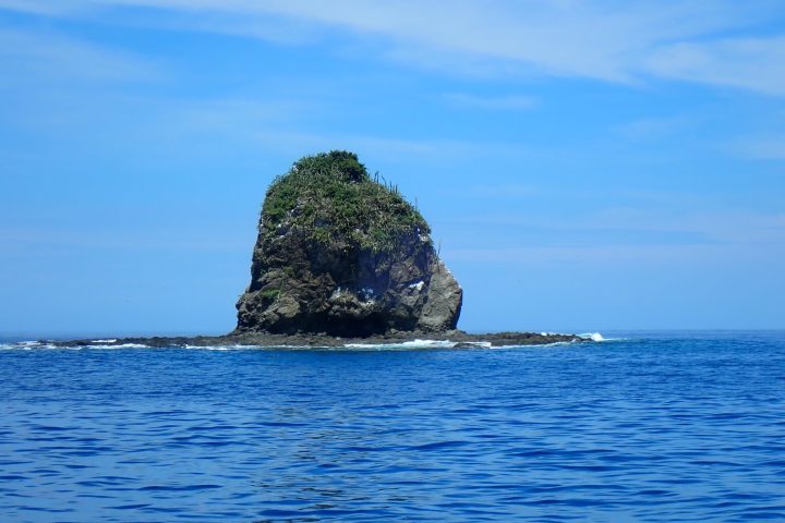 an island in the middle of a body of water