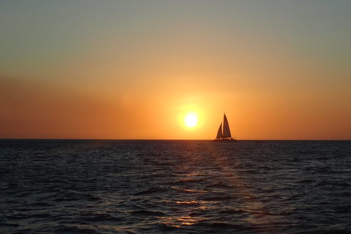 a sunset over a body of water