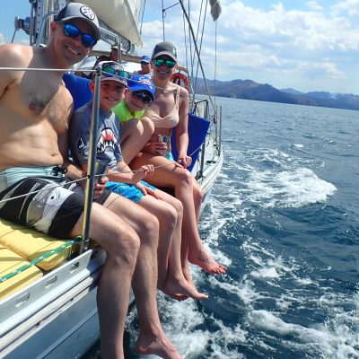 a person riding a surf board on a body of water