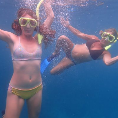 a woman swimming in the water