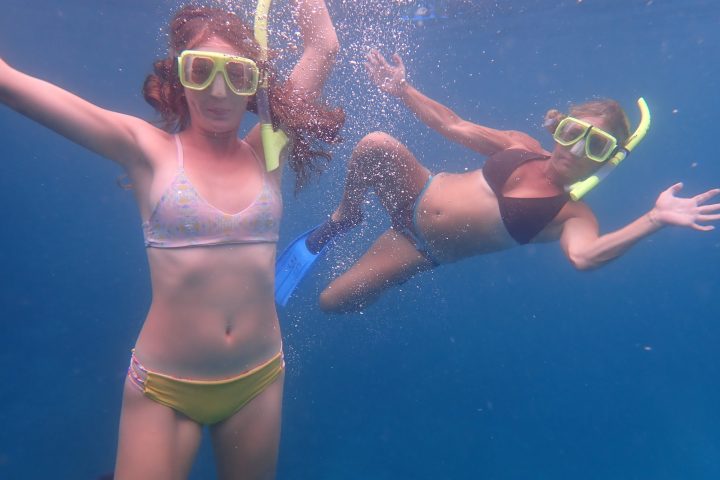 a woman swimming in the water