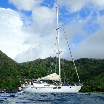 a small boat in a large body of water