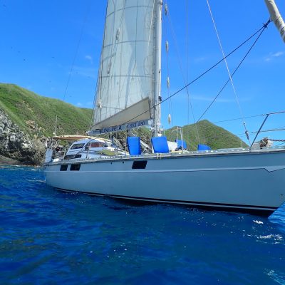 a small boat in a large body of water