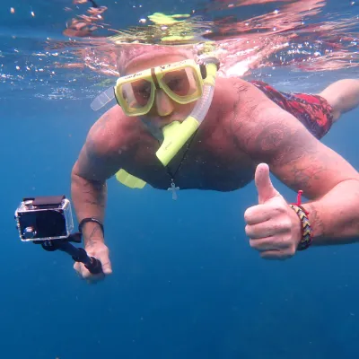 a man swimming in the water