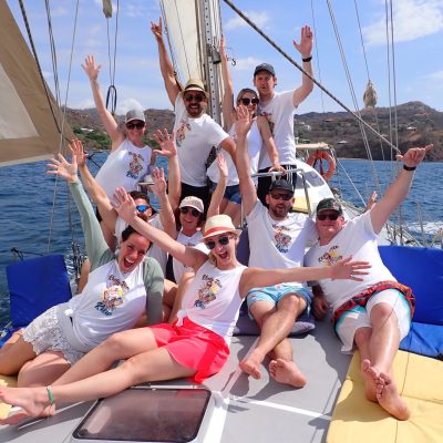 a group of people riding on the back of a boat