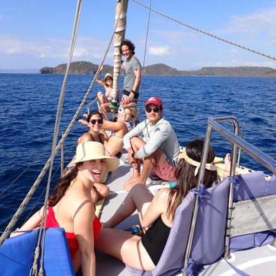 a person sitting on a boat in a body of water