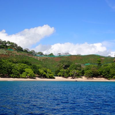 an island in the middle of a body of water