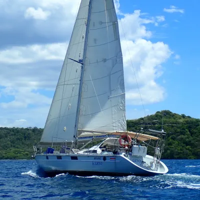 a small boat in a large body of water